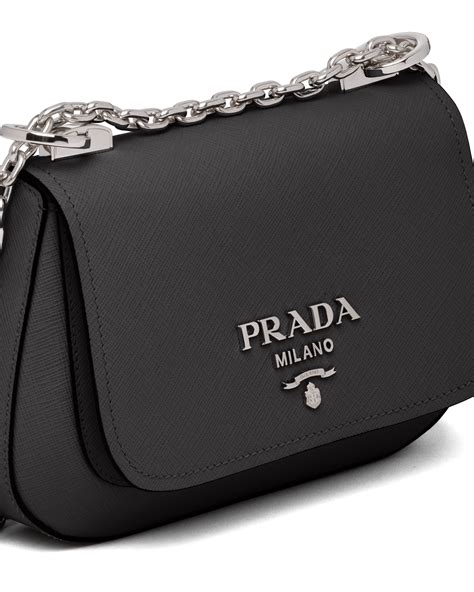 prada shoulder bag saffiano cuir with accessories medium nero|Prada adjustable shoulder handbags.